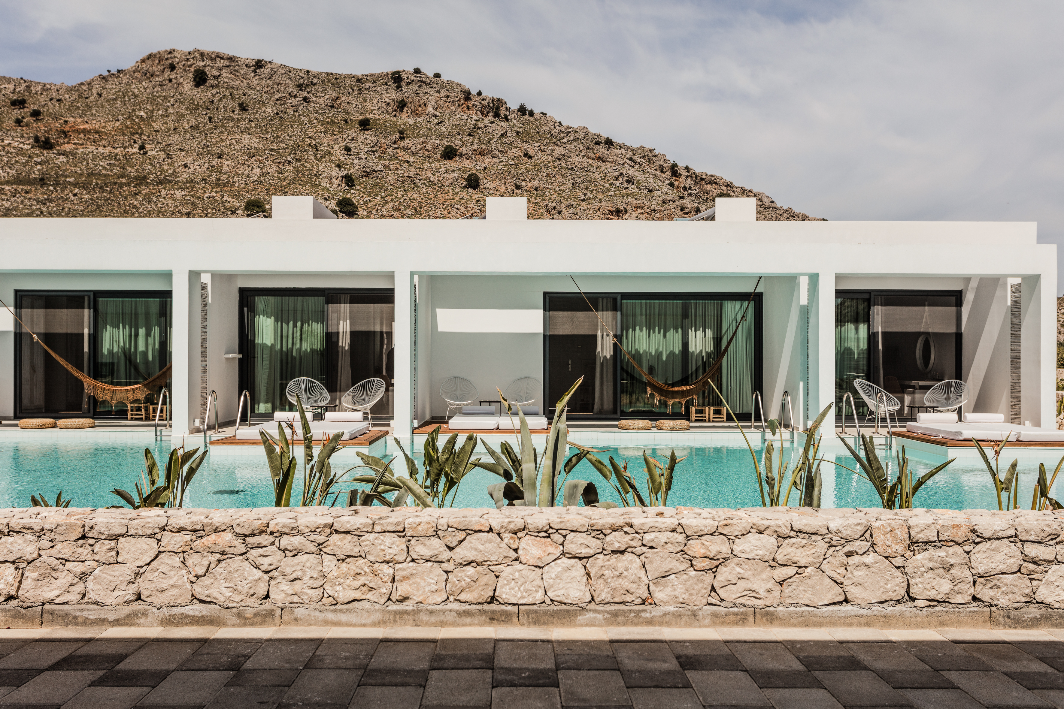 Casa Cook Rhodes — pool and raw textures in Rhodes